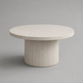 Table basse ronde 100x100x40 cm MDF effet pierre blanc cassé avec pied cylindrique rainuré